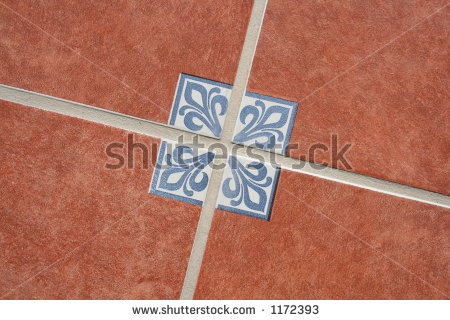 stock-photo-terracotta-tiles-on-the-floor-with-a-traditional-mexican-pattern-1172393